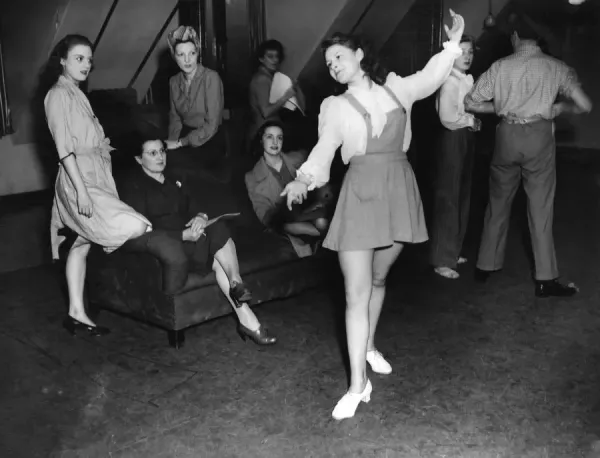 Windmill girls in 1946 dance  /  dancing  /  party season  /  celebration  /  happy vintage