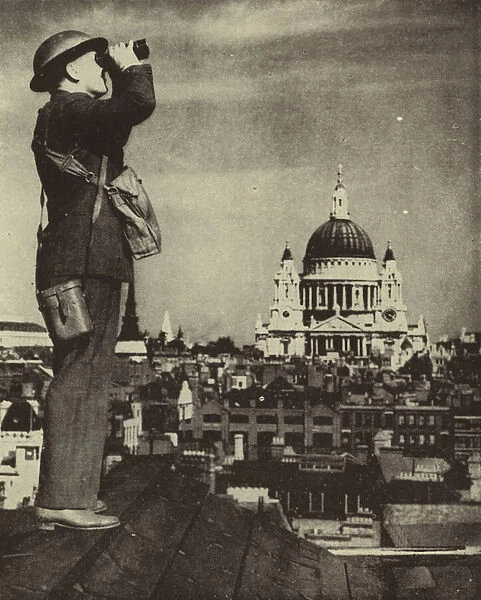Aircraft spotter looking out for German bombers from a London rooftop during the Blitz, World War II, 5 September 1940 (b  /  w photo)