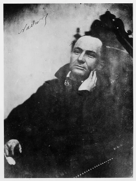 Charles Baudelaire (1821-67) seated in a Louis XIII armchair, 1855 (b  /  w photo)