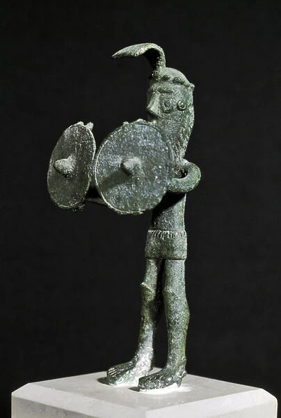 A demonic creature armed with a double shield, 8th-7th century BC (bronze statuette)