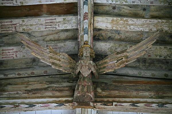 Depicting a view of one of the carved wooden angels in the nave
