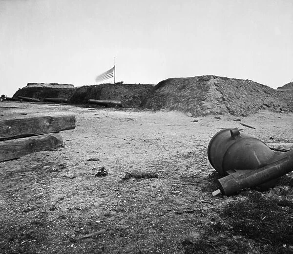 Discarded Confederate mortar at abandoned Fort Johnson, Charleston Harbor, South Carolina, 1865 (b  /  w photo)