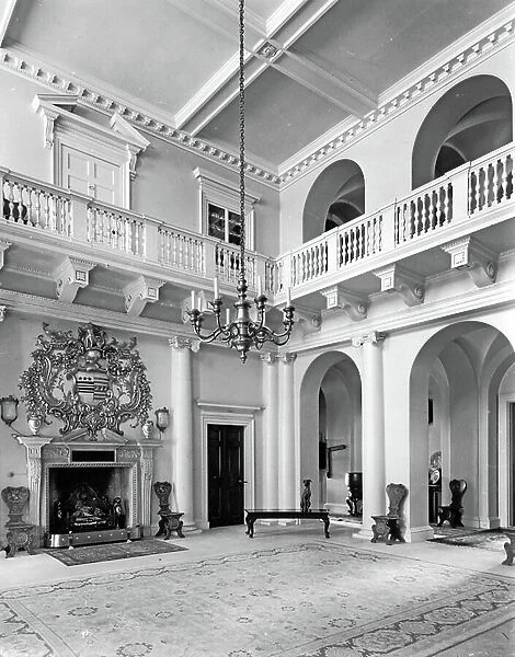 The double-height hall, Buxted Park, Sussex, from The English Country House (b / w photo)