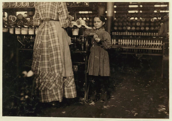 Fannie, 48 inches high, aged 7, one of 19 children helping her sister in Elk Mills