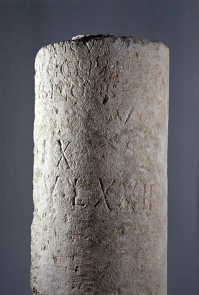 Fragment of Milliaire Borne by Maximin of Thrace, Gallo-Roman (upper detail), 237 after Jesus Christ. Dim: 222x37 (diameter) x64cm. Limestone of Ambrault. Musee de l'hospice Saint-Roch, Issoudun. Mandatory mention
