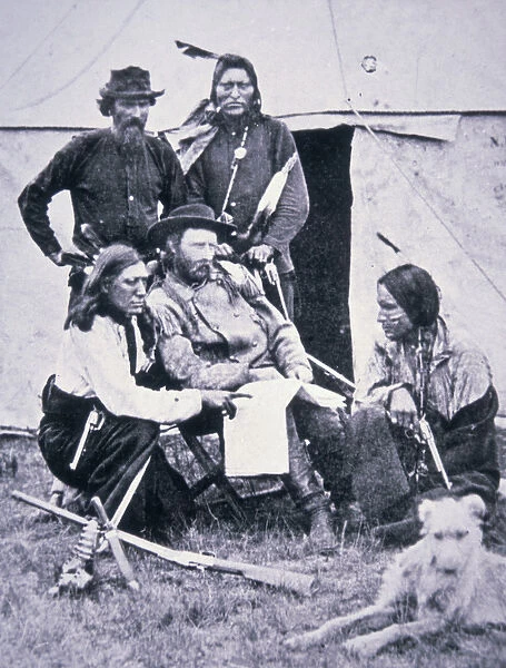 General George A. Custer (1839-76) with his Indian scouts during the Yellowstone