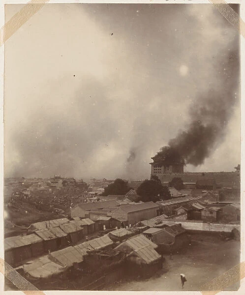 A great fire at the main gate of Peking, 1900 (b  /  w photo)