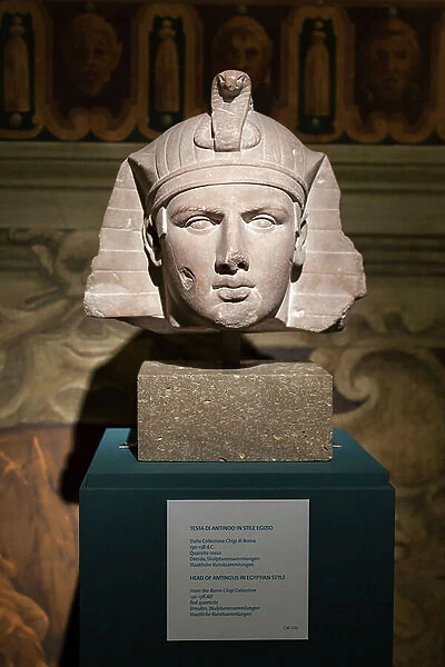 Head of Antinous in Egyptian style, 130-138 AD (red quartzite)