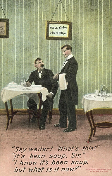 Man complaining about his meal to a waiter (colour photo)