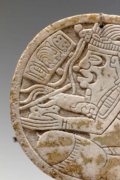 Detail from a Mayan shell roundel, depicting a crosslegged scribe with pen in hand, c