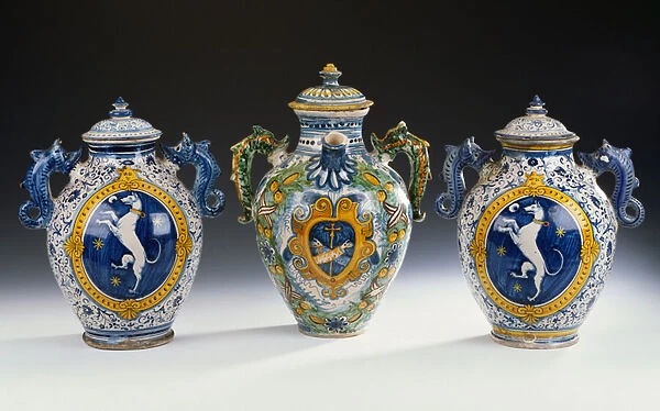A pair of Montelupo armorial two-handled oviform vases and a wet-drug jar (ceramic)