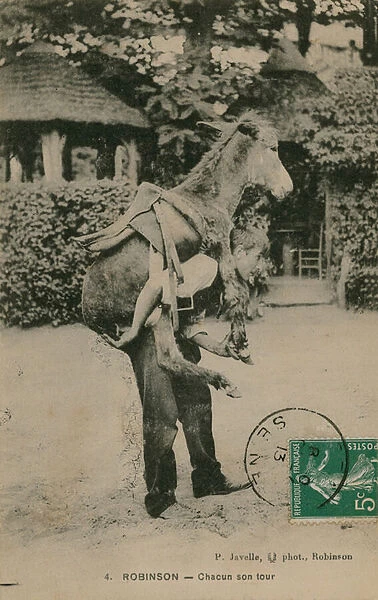 Postcard of a man carrying a donkey, sent in 1913 (b  /  w photo)