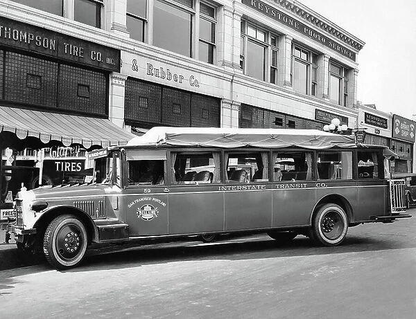 San Francisco, California: An Interstate Transit Company Bell Line bus parked on the street. It ran between San Francisco and Portland, c.1922 (b / w photo)