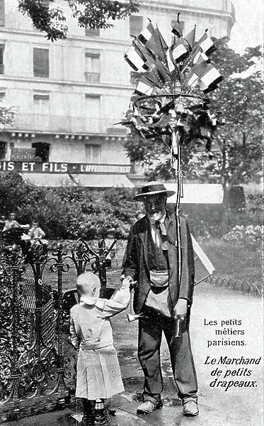 Seller of small flags, Paris, c. 1900