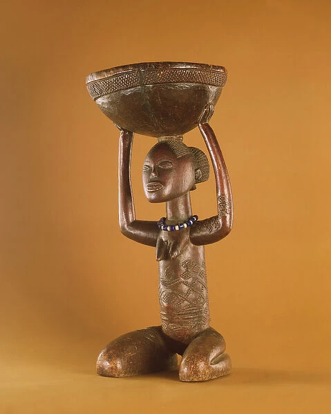 Stoolwith a kneeling female caryatid, Democratic Republic of the Congo (wood & glass beads)
