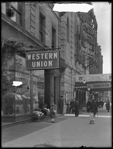 Western Union office sign at W. 125th Street and St. Nicholas Avenue, New York City
