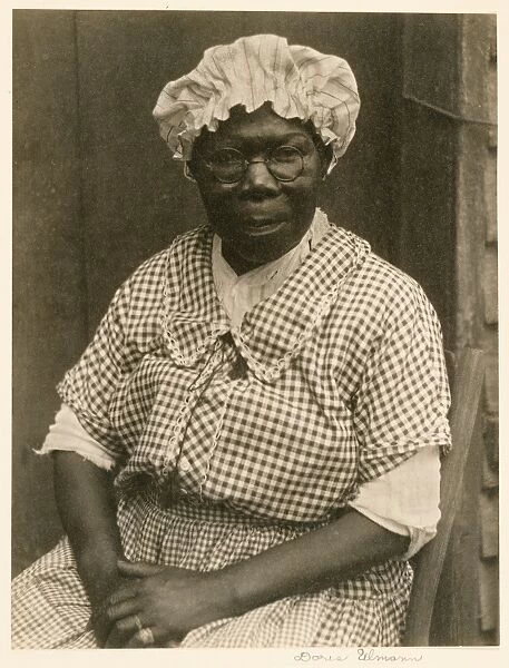[Black Woman in Cap and Gingham Dress]