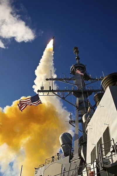The Aegis-class destroyer USS Hopper launching a standard missile 3 Blk IA in Kauai