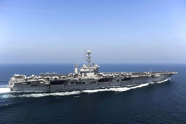 Aircraft carrier USS John C. Stennis transits the Arabian Gulf