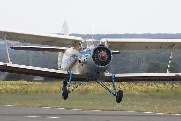 An Antonov An-2 taking off from an airfield in Bulgaria