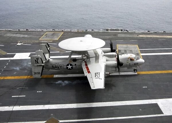 An E-2C Hawkeye makes an arrested landing aboard USS George Washington
