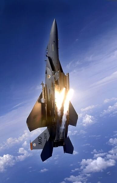 An F-15E Strike Eagle pops flares