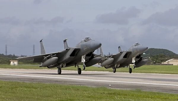 Two F-15s come in for a landing at Kadena Air Base, Okinawa, Japan