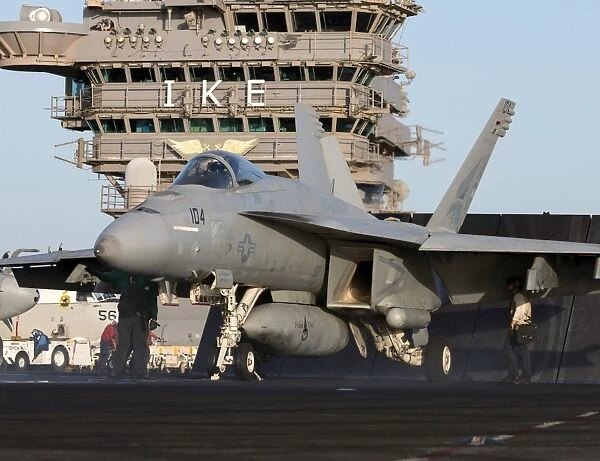 An F  /  A-18E Super Hornet during flight operations on USS Dwight D. Eisenhower