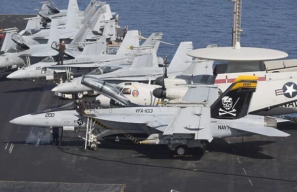 A group of F  /  A-18F Super Hornets on the flight deck of USS Dwight D. Eisenhower