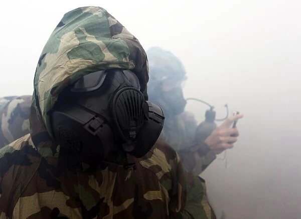 A Marine wearing a gas mask during during chemical warfare training