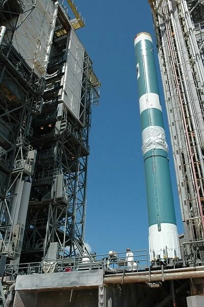 The mobile service tower approaches the Delta II rocket