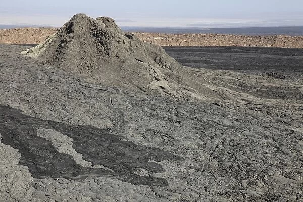 Old hornito rising from floor of caldera, Erta Ale volcano, Danakil Depression, Ethiopia