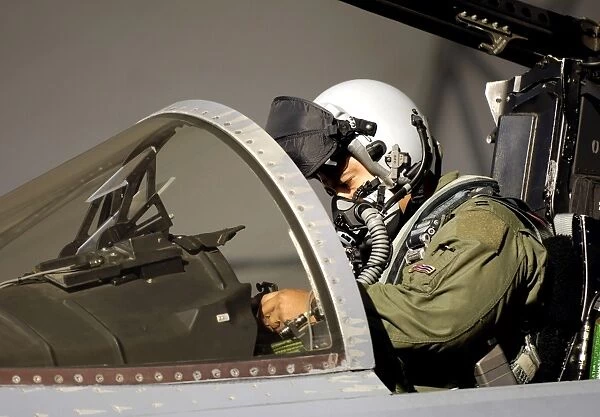 A pilot prepares his F-15A Eagle