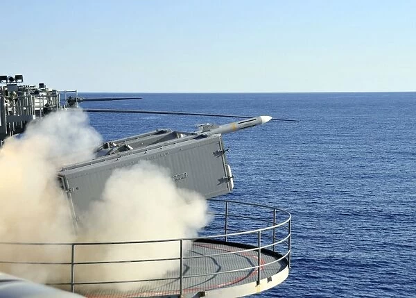 A RIM-7 Sea Sparrow is launched from a Mk-57 aboard aircraft carrier USS Enterprise