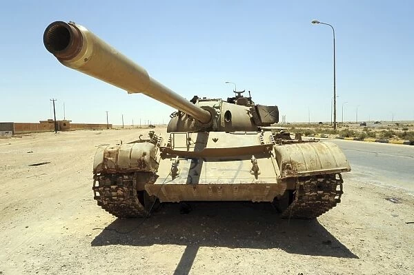 A T-55 tank destroyed by NATO forces in the desert north of Ajadabiya, Libya