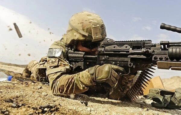 U. S. Air Force soldier fires the Mk48 super SAW machine gun