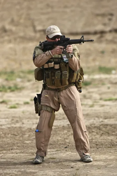 U. S. Contractor firing a M4 Carbine