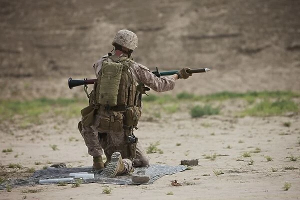 U. S. Marine prepares a fragmentation round for the RPG-7