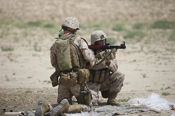 U. S. Marines prepare a fragmentation round for the RPG-7