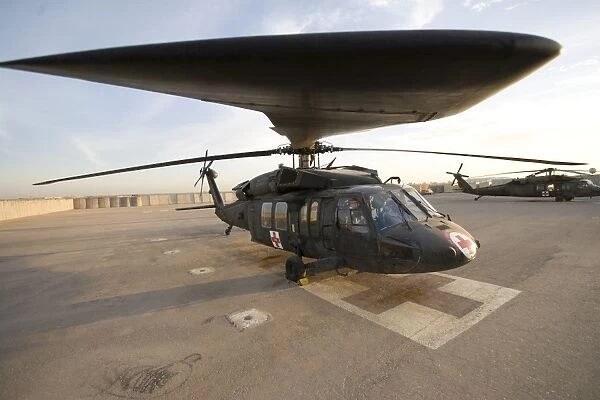 A UH-60 Blackhawk Medivac helicopter sits on the flight deck at Camp Warhorse