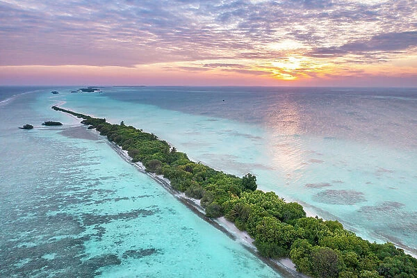 Sunset over Dhigurah Island, South Ari Atoll, Maldives, Indian Ocean. February, 2020