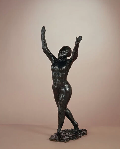 Dancer Moving Forward, Arms Raised, c. 1882-1898  /  cast c. 1919-1931. Creator: Edgar Degas