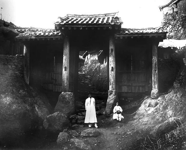 Entrance to a village, Korea, 1900