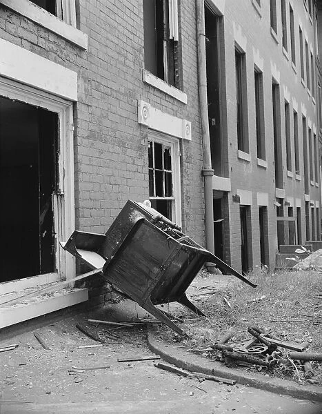 Exteriors of houses being wrecked on Independence Avenue, Washington, D. C, 1942. Creator: Gordon Parks