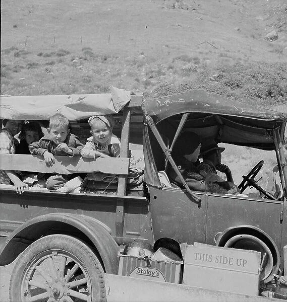 Family of drought refugees on US 99 near Bakersfield, California, 1937. Creator: Dorothea Lange