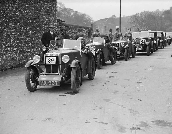 MG M type of EG Farrow at the head of a line of cars competing in the MCC Sporting Trial, 1930