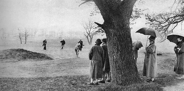Playing golf on Tooting Bec Common, London, 1926-1927