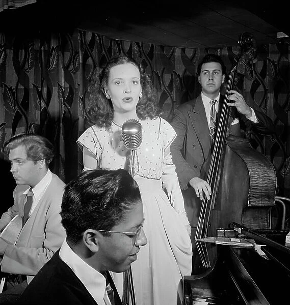 Portrait of Deryk Sampson, Lynn Carver, Justin Arndt, and Clair Dorward, Famous Door, N.Y. 1947. Creator: William Paul Gottlieb