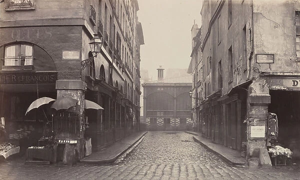 Rue du Contrat-Social, de la rue de la Tonnellerie, 1864-1865. Creator: Charles Marville