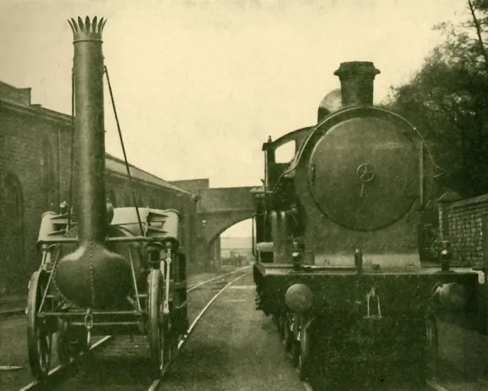 Framed Print : A Full Size Model of Stephensons Rocket alongside an Engine, 1930 Print Framed Print : A Full Size Model of Stephensons Rocket alongside an Engine, 1930 Print
